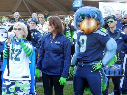 There seems to be some excitement in the air. "Go Hawks!" everyone keeps yelling. That's My Momma, Terri Fletcher, leading a spirited rally at Marina Park.  